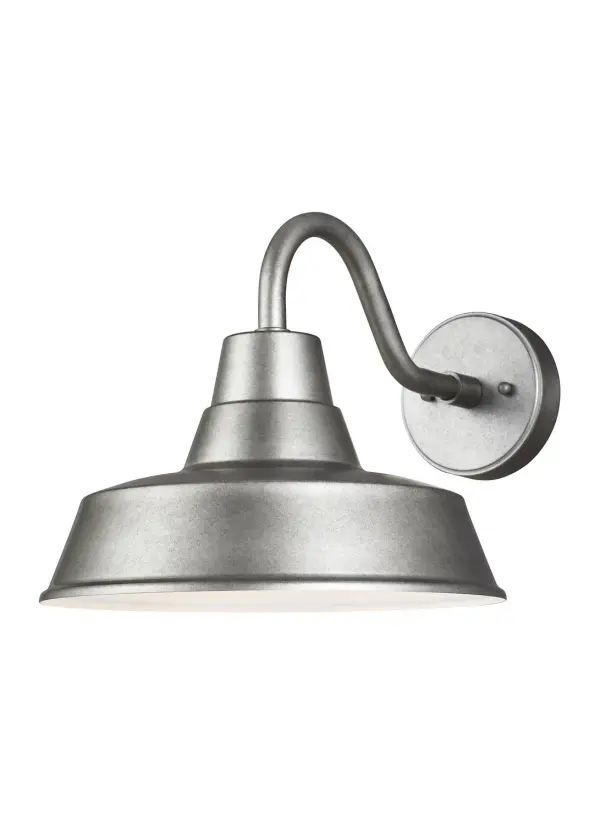 Hand-crafted aluminum wall lantern delivers authentic farmhouse charm with modern LED efficiency. Wet-rated for all weather conditions, this fixture provides focused downward light ideal for entryways and outdoor living spaces.