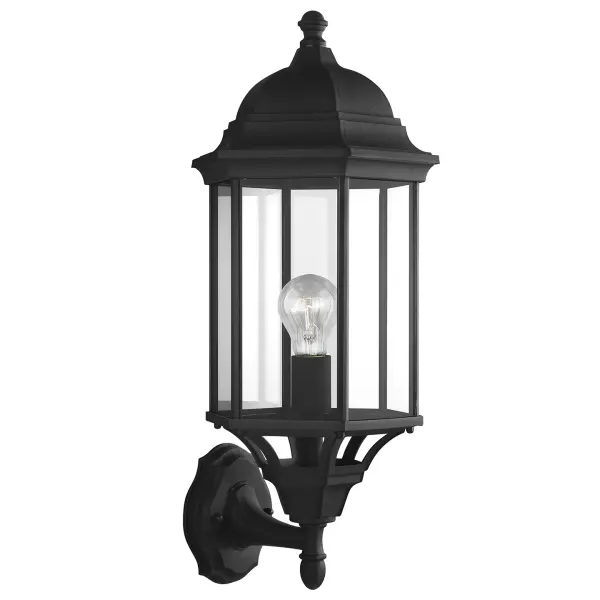 The Sevier Large Wall Lantern delivers upward illumination in a sleek black finish, perfect for modern exteriors. Its substantial size makes a bold architectural statement while providing functional lighting.
