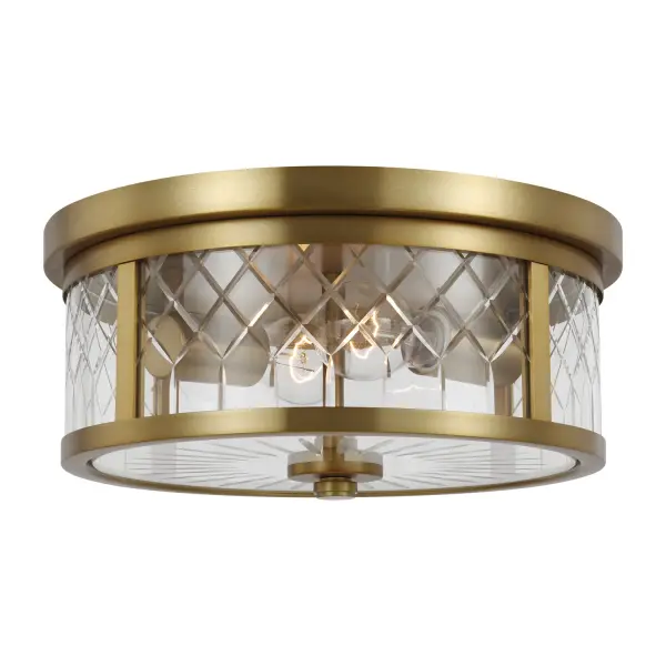 The Alec flush mount by Alexa Hampton combines classical elegance with transitional versatility. Its burnished brass finish and cut glass shades create sophisticated ambient lighting in a compact profile.
