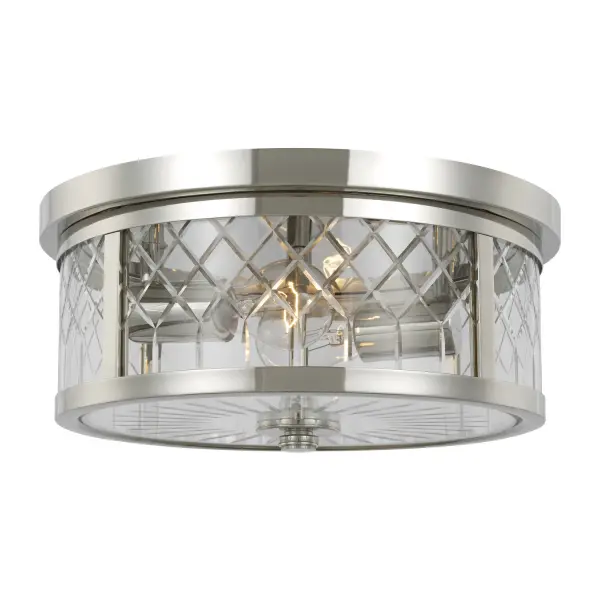 The Alec flush mount by Alexa Hampton combines classical elegance with transitional versatility. Its polished nickel finish and cut glass shades create sophisticated ambient lighting in a compact 13-inch profile.