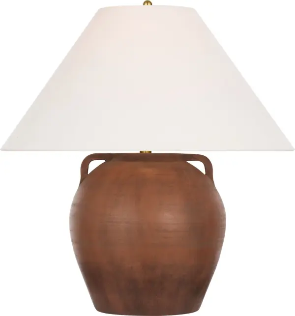 The Mason Table Lamp showcases handcrafted terracotta in its natural, earthy finish paired with a soft linen shade. At 26" tall, it provides substantial presence while maintaining versatility across traditional and contemporary interiors.