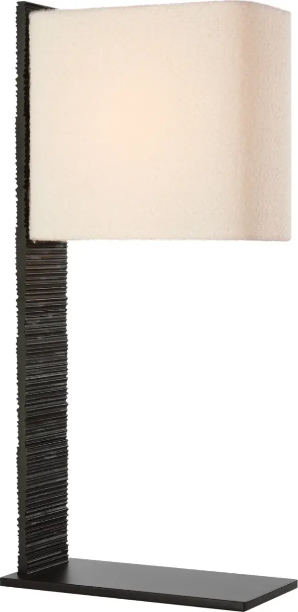 The Fumar 34" table lamp commands attention with its dramatic ridged carbon ceramic base and sophisticated bouclé shade. This statement piece combines sculptural form with contemporary elegance, perfect for elevating modern interiors.