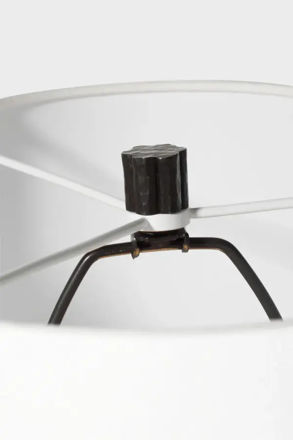 The Shae floor lamp combines artistic sculptural form with functional lighting. At 65" tall, it makes a bold statement while the aged iron finish and natural linen shade create warmth and sophistication in any space. - alternate view