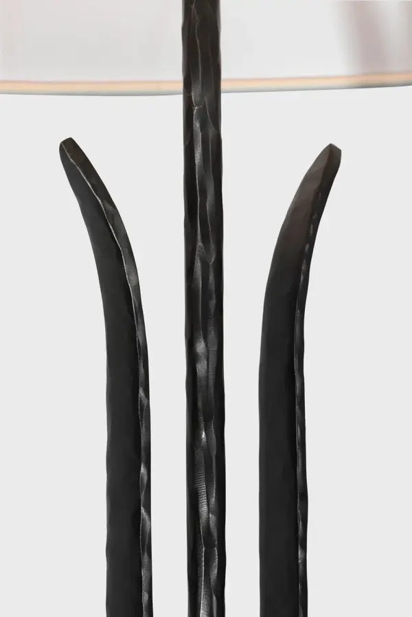 The Olivette floor lamp combines artisanal forged metalwork with a classic linen shade, creating a statement piece that bridges traditional craftsmanship and modern design sensibilities. - alternate view