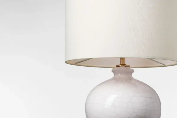 The Gaios cordless accent lamp combines portability with refined style. Its crackled ivory ceramic base and linen shade create a sophisticated look perfect for any room. Battery-powered convenience eliminates cord clutter. - alternate view