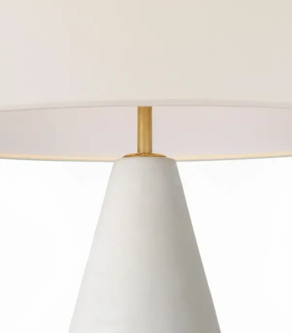 The Mathis table lamp features a beautifully sculpted ceramic body in soft Chantilly white, paired with a classic linen shade. At 29" tall, it provides substantial presence while maintaining refined proportions perfect for sophisticated interiors. - alternate view