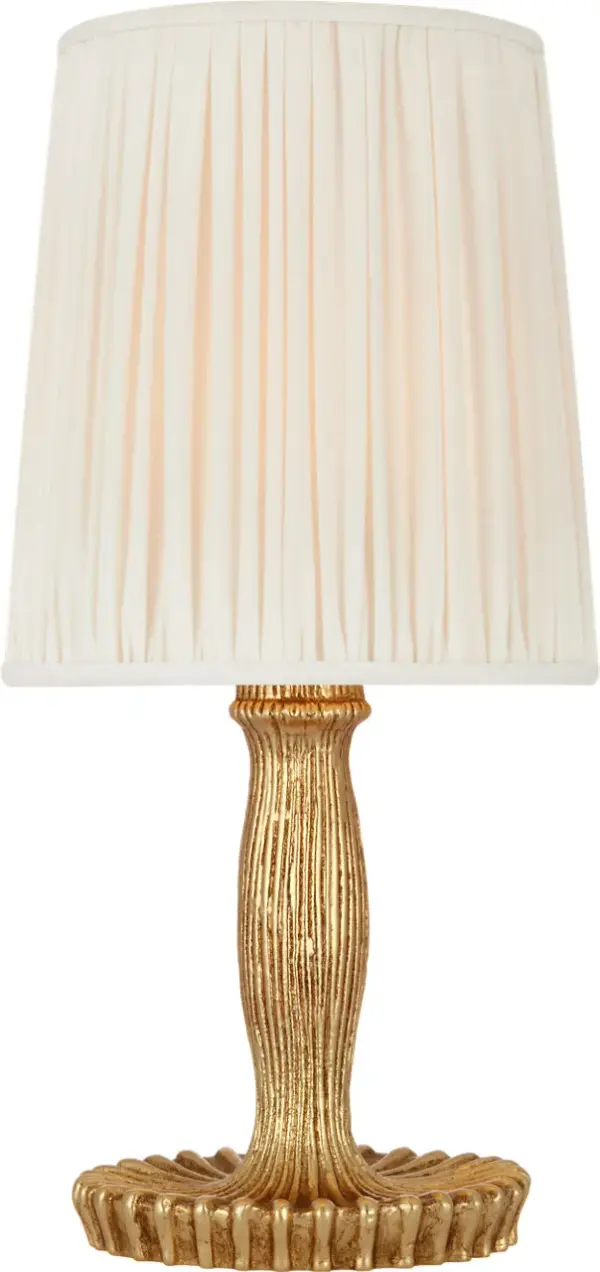 The Ovid cordless accent lamp combines sophisticated gold lustre finish with practical wireless functionality. Its silk pleated shade provides warm, diffused light while the compact 14" size fits beautifully on any surface.