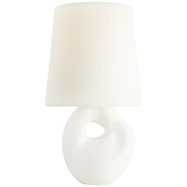 The Adria cordless table lamp combines sophisticated plaster white ceramic with a soft linen shade, offering wireless convenience without sacrificing style. Perfect for spaces lacking outlets or outdoor entertaining.