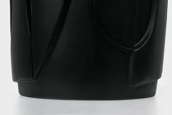 The Klint table lamp combines classic proportions with contemporary styling. Its 28-inch height makes it ideal for living spaces and bedrooms, while the matte black finish and linen shade create versatile elegance. - alternate view