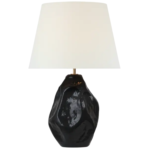 The Rocco table lamp combines timeless elegance with modern versatility. At 27" tall, it provides substantial presence while the black finish and linen shade create a refined, understated aesthetic perfect for contemporary and traditional spaces alike.
