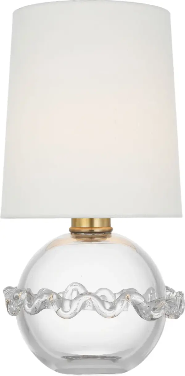 The Breslin cordless accent lamp combines timeless clear glass with a soft linen shade, offering portable lighting elegance. At 16" tall, it's perfectly sized for bedside tables, desks, or console surfaces.