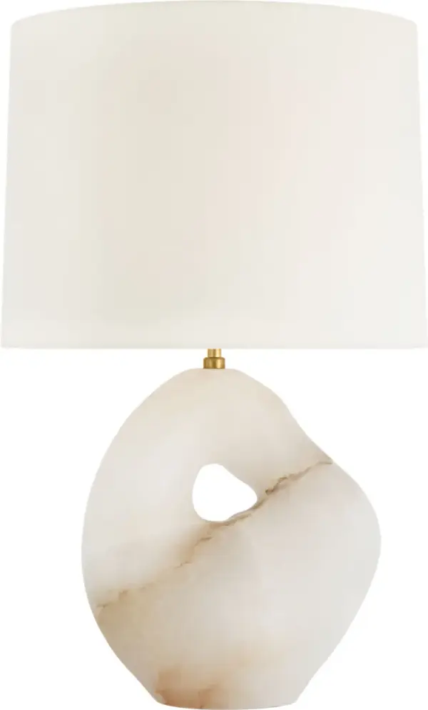The Adria table lamp showcases the organic beauty of natural alabaster stone paired with a classic linen shade. At 25" tall, this substantial piece brings sophisticated lighting and sculptural presence to any space. - alternate view