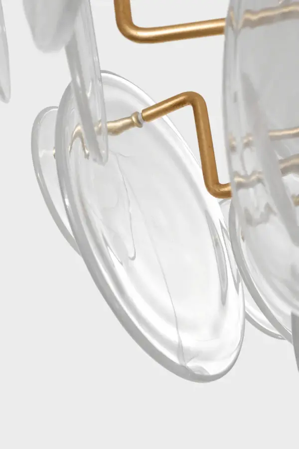 The Loire Grande Entry Chandelier brings sophisticated Italian design to expansive interiors. Hand-blown strié glass discs create an ethereal glow while the fluid cascading silhouette makes a dramatic statement in foyers and dining rooms. - alternate view