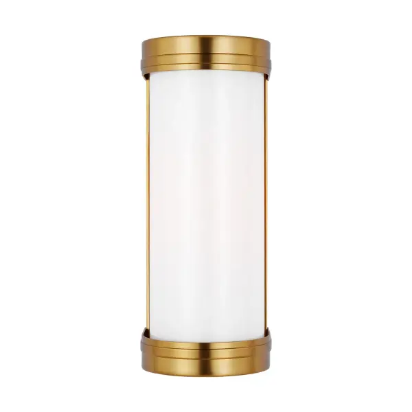 Alexa Hampton's Ifran vanity light reimagines neo-classic design with a streamlined tubular silhouette. The burnished brass finish and opal etched glass create sophisticated ambient lighting perfect for modern bathrooms and powder rooms.