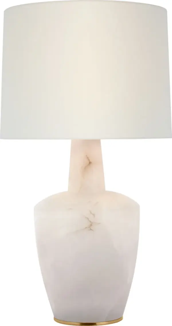 The Paros 31" table lamp showcases the natural beauty of alabaster stone with a sophisticated linen drum shade. Its substantial height and organic material create a luxurious focal point perfect for transitional and coastal-inspired interiors.