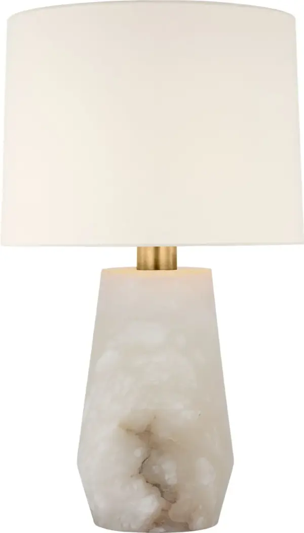The Corfu 32" table lamp showcases the natural beauty of alabaster stone paired with a refined linen shade. Its substantial height and organic material create a sophisticated focal point for transitional and contemporary interiors.