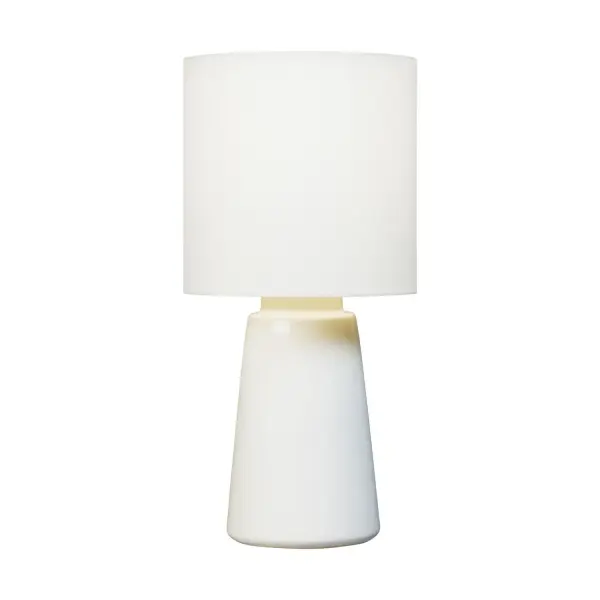 Barbara Barry's Vessel table lamp combines modern minimalism with organic warmth through its simple ceramic form and earthy New White finish. The white linen shade softens light beautifully for bedside or desk use.