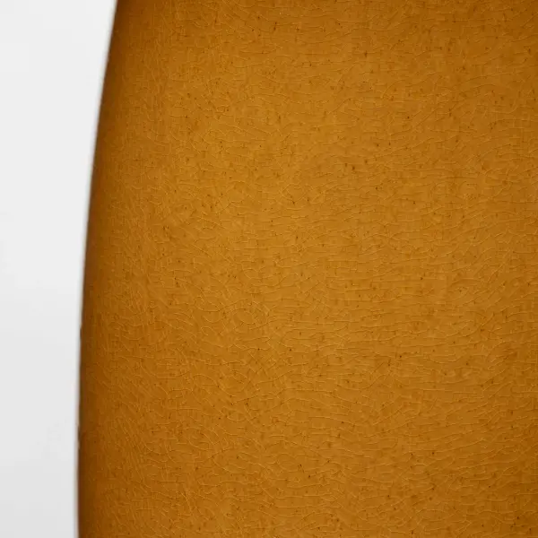 The Roma Table Lamp by Barbara Barry combines timeless elegance with modern sensibility. Its elongated oval ceramic base in sophisticated olive finish pairs beautifully with a tailored linen shade for warm, diffused lighting. - alternate view