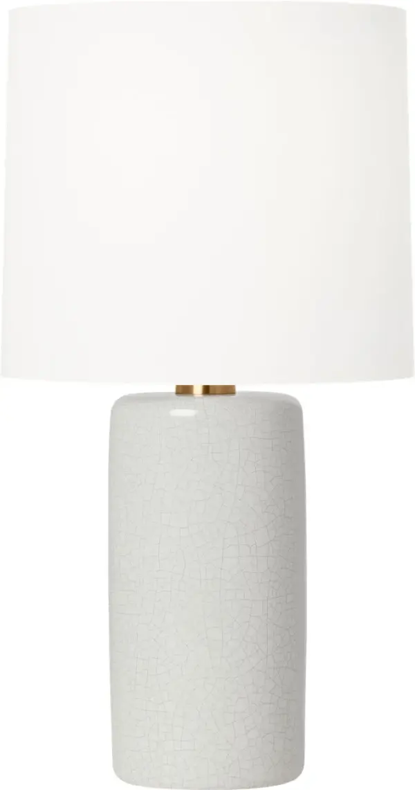 Barbara Barry's Shanghai Table Lamp combines a sleek cylindrical ceramic base with a tailored linen shade for understated elegance. The white crackle finish adds subtle texture while maintaining versatility across modern and transitional interiors.
