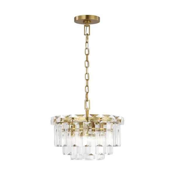 The Arden chandelier brings 1920s Parisian glamour to modern spaces with its architectural tiered design and textured glass panels. The burnished brass finish adds warmth while the geometric form provides visual interest without overwhelming smaller spaces.
