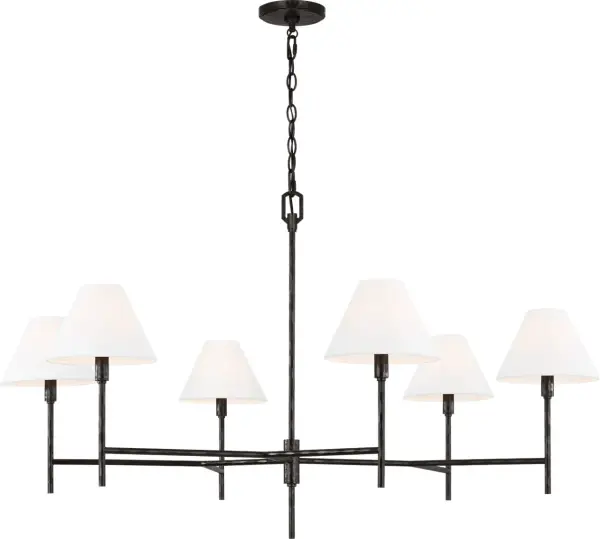 The Ridgewood Extra Large Chandelier by Chapman & Meyers transforms any space with its vintage star-shaped design and hand-forged texture. The aged iron finish adds timeless character while the substantial scale commands attention in grand spaces.