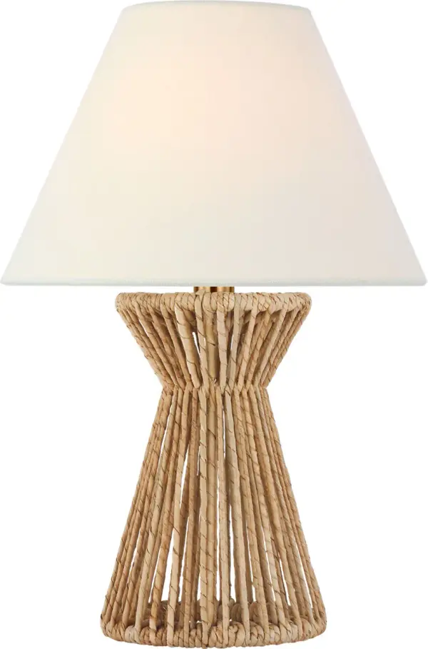 The Antigua cordless accent lamp brings organic warmth and flexibility to any space with its handwoven natural abaca base and soft linen shade. Perfect for creating ambiance without outlet constraints.