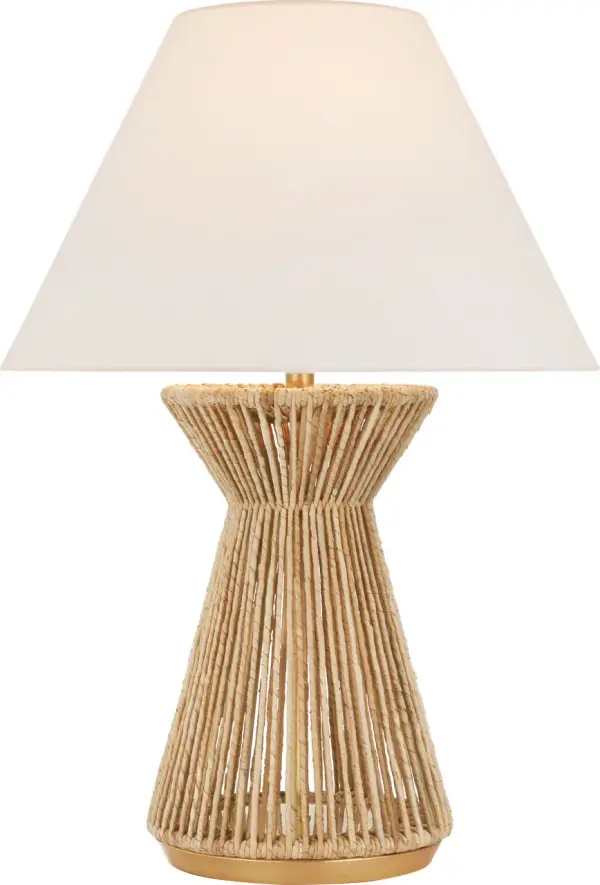 The Antigua table lamp brings organic coastal elegance with its natural abaca woven base and antique-burnished brass details. At 30" tall, it makes a sophisticated statement while the neutral linen shade provides warm, diffused light.