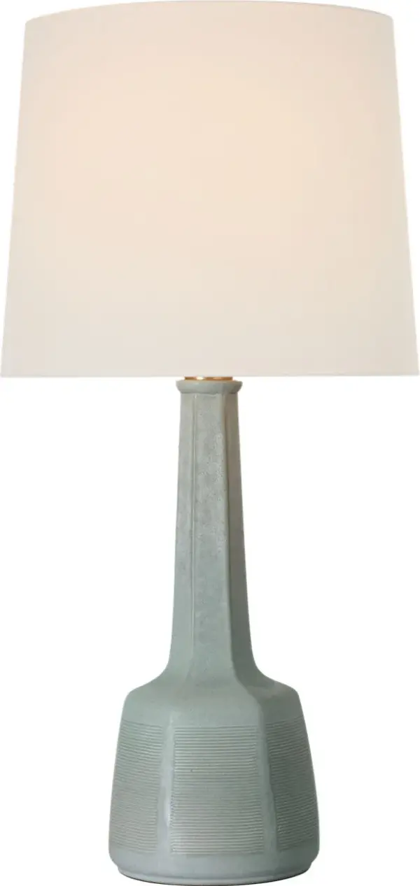 The Lerio table lamp brings refined coastal elegance with its distinctive dusted jade ceramic base and classic linen shade. At 31" tall, it provides substantial presence while maintaining versatility across traditional and contemporary interiors. - alternate view