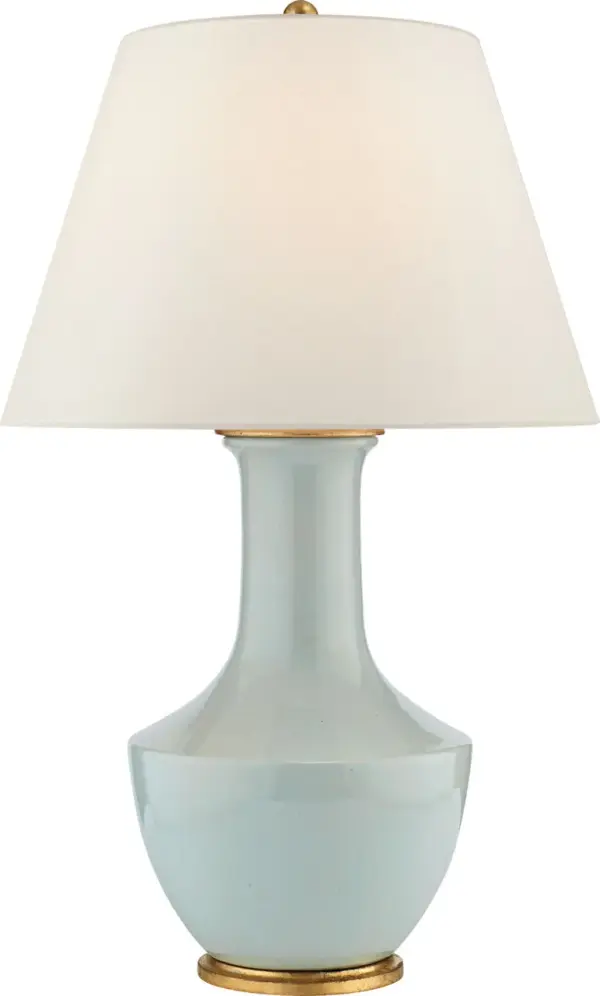 The Lambay cordless table lamp combines sophisticated style with modern portability. Its ice blue ceramic base and linen shade create a serene, coastal aesthetic while rechargeable technology eliminates cord clutter.
