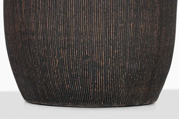 The Portis 32" table lamp showcases handcrafted terracotta with a distinctive combed texture and black wash finish. Its substantial 32" height makes a bold statement while the natural linen shade softens the light beautifully. - alternate view