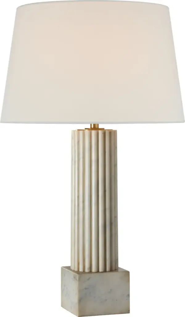 The Reeve table lamp combines natural Carrara marble with a classic linen shade for sophisticated lighting. At 29" tall, it provides substantial presence while maintaining refined proportions for versatile placement. - alternate view