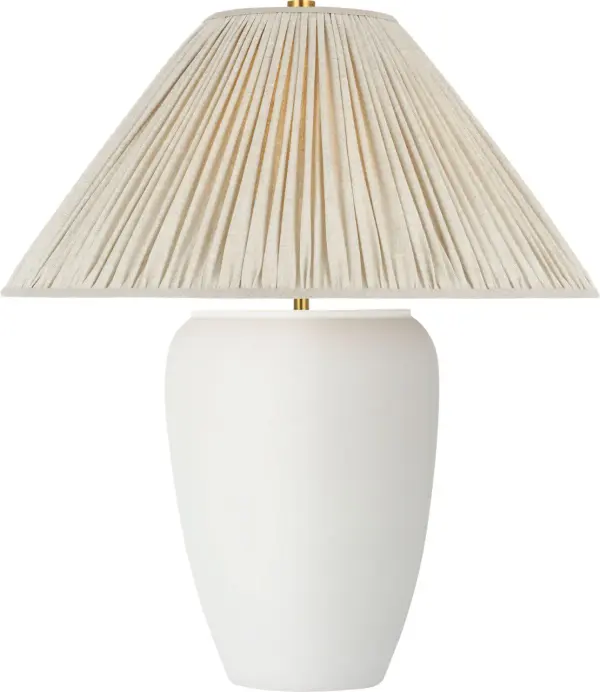 The Anwen cordless table lamp combines sophisticated design with modern convenience. Its portable, rechargeable design eliminates cord clutter while the pleated linen shade and Chantilly finish create a refined aesthetic.