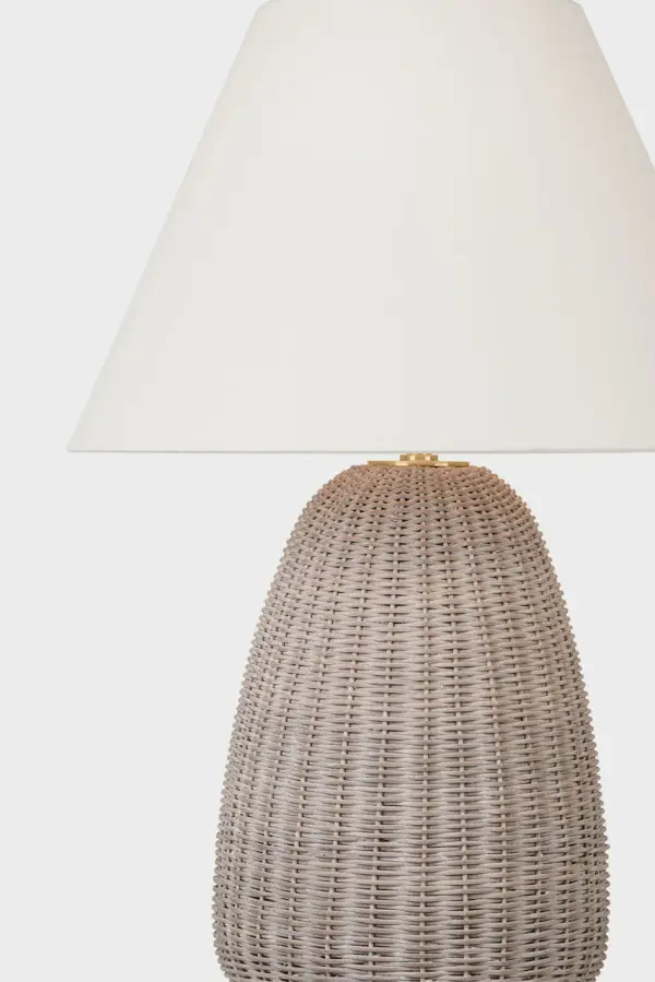 The Kokomo table lamp brings organic warmth through handcrafted ash wicker paired with antique-burnished brass details. At 30" tall, it provides substantial presence while maintaining versatility across coastal, transitional, and organic modern interiors. - alternate view