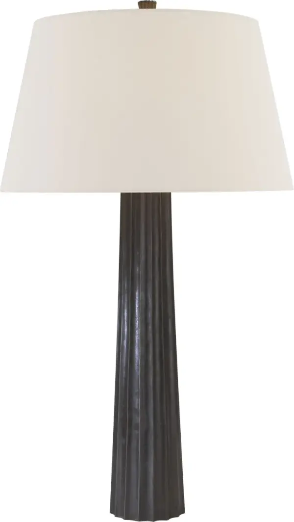 The Fluted Spire combines sophisticated architectural detailing with modern cordless technology. Its aged iron finish and classic linen shade create timeless appeal, while battery operation offers placement flexibility.