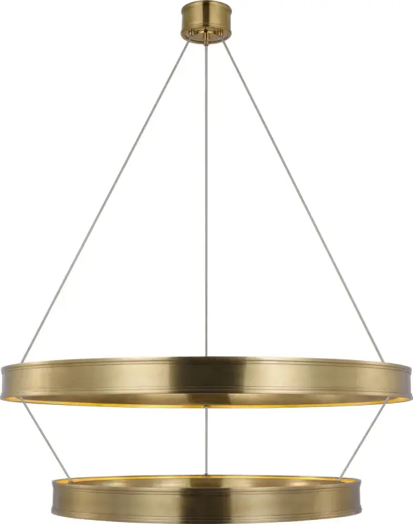 The Connery 40" chandelier commands attention with its dramatic two-tier ring design and warm antique-burnished brass finish. Perfect for large dining rooms and grand entryways, this substantial fixture combines contemporary geometry with classic metalwork.