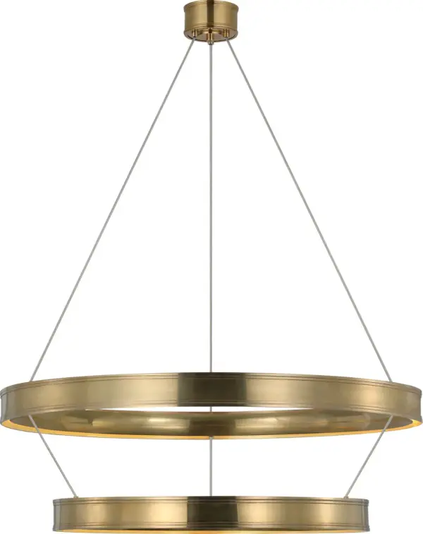 The Connery 40" chandelier commands attention with its dramatic two-tier ring design and warm antique-burnished brass finish. Perfect for large dining rooms and grand entryways, this substantial fixture combines contemporary geometry with classic metalwork. - alternate view