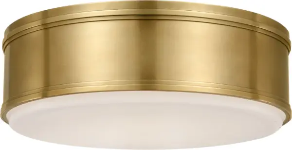 The Marden 18" flush mount combines classic brass warmth with clean contemporary lines. Its white glass diffuser provides soft, even illumination while the antique-burnished brass finish adds sophisticated character to any space. - alternate view