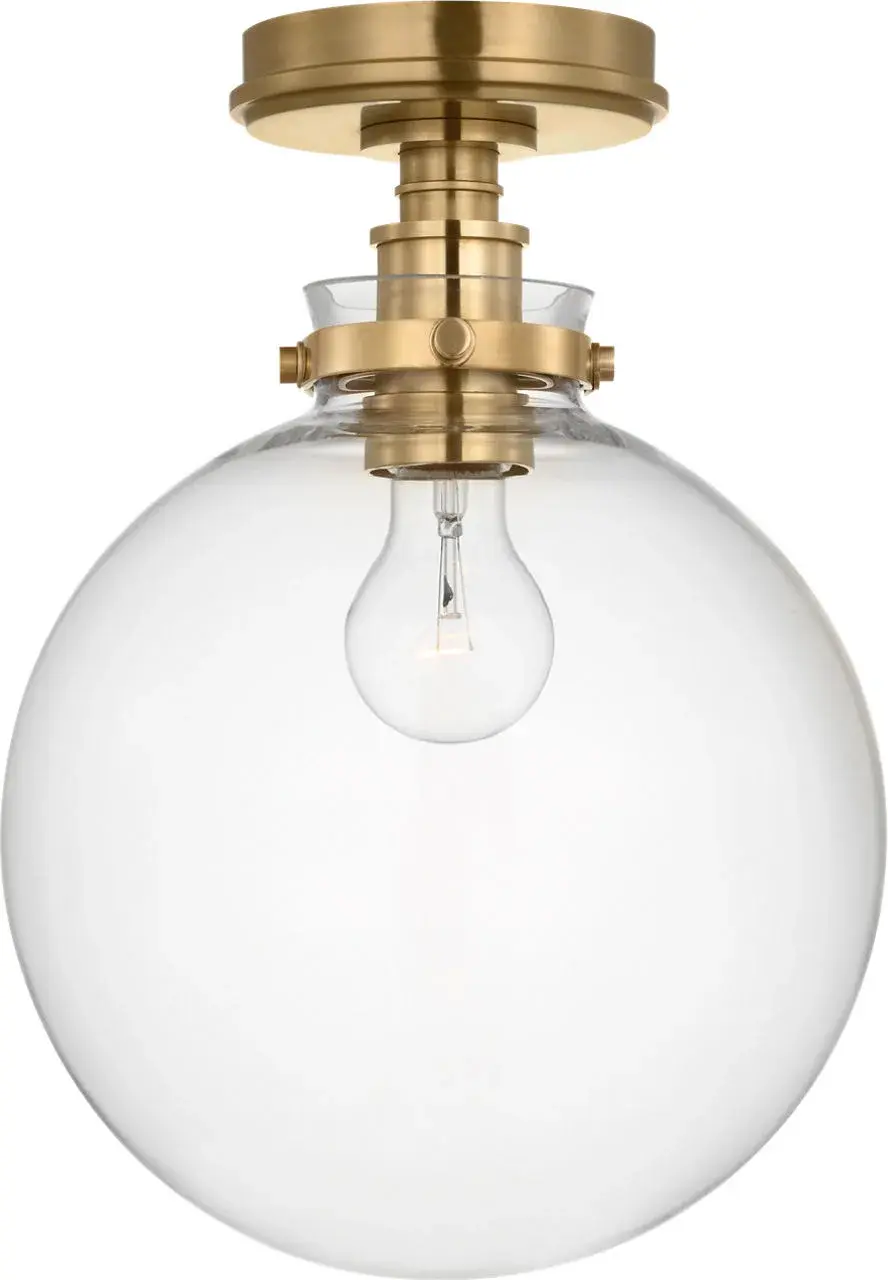 Parkington 10" Globe Flush Mount in Antique-Burnished Brass with Clear Glass - Image 2