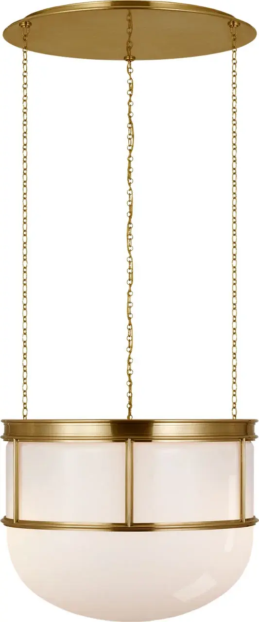 The Martil 24" Lantern combines classic lantern styling with sophisticated antique-burnished brass and white glass panels. Its substantial size makes a commanding statement in foyers and dining rooms.