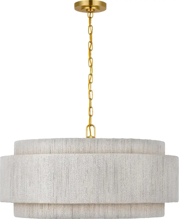 The Dorado chandelier masterfully blends warm antique brass with handcrafted washed abaca weaving, creating a statement piece that brings organic texture and refined coastal charm to any space. - alternate view