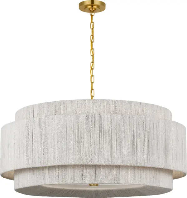 The Dorado 40" chandelier masterfully combines antique-burnished brass with woven abaca for a sophisticated organic aesthetic. Its generous scale and natural materials create dramatic visual impact while maintaining warmth.