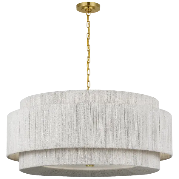The Dorado 40" chandelier masterfully combines antique-burnished brass with woven abaca for a sophisticated organic aesthetic. Its generous scale and natural materials create dramatic visual impact while maintaining warmth. - alternate view