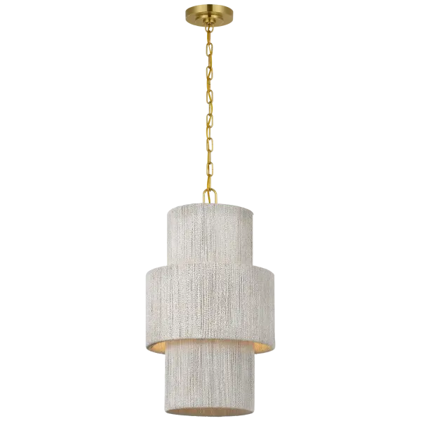 The Dorado pendant combines antique-burnished brass with hand-woven abaca for a sophisticated coastal aesthetic. At 15 inches, it's perfectly scaled for intimate dining spaces, kitchen islands, or as a statement piece in bedrooms and foyers. - alternate view
