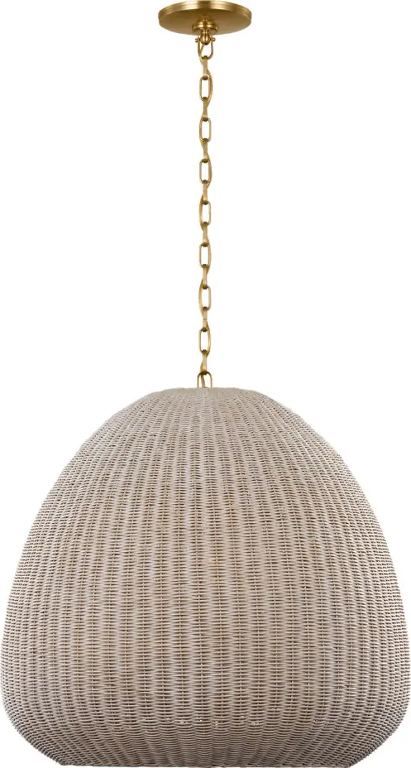 The Kokomo 30" pendant combines handwoven ash wicker with antique-burnished brass for a sophisticated coastal aesthetic. Its generous scale and natural materials create warm, diffused lighting perfect for dining and gathering spaces.
