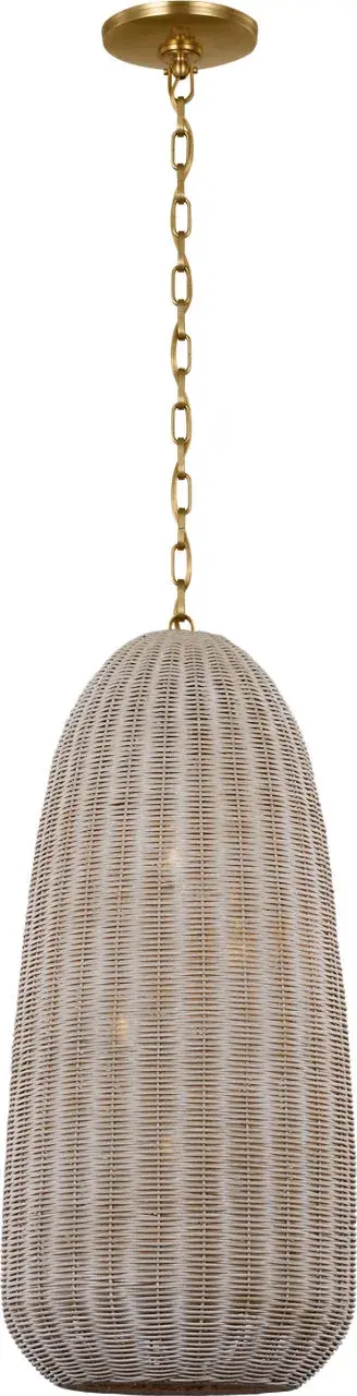 The Kokomo pendant beautifully blends natural ash wicker with antique brass for a sophisticated coastal aesthetic. Its elongated 15-inch profile provides focused illumination while the woven shade creates warm, ambient light patterns. - alternate view