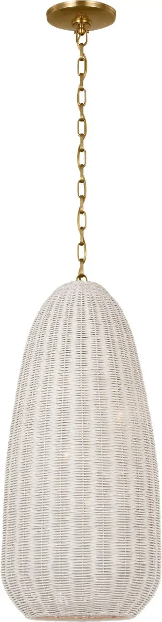 The Kokomo pendant brings organic texture and warmth through its handwoven chalk wicker shade paired with antique-burnished brass hardware. Its elongated 15" profile creates visual interest while maintaining an intimate scale perfect for smaller spaces. - alternate view