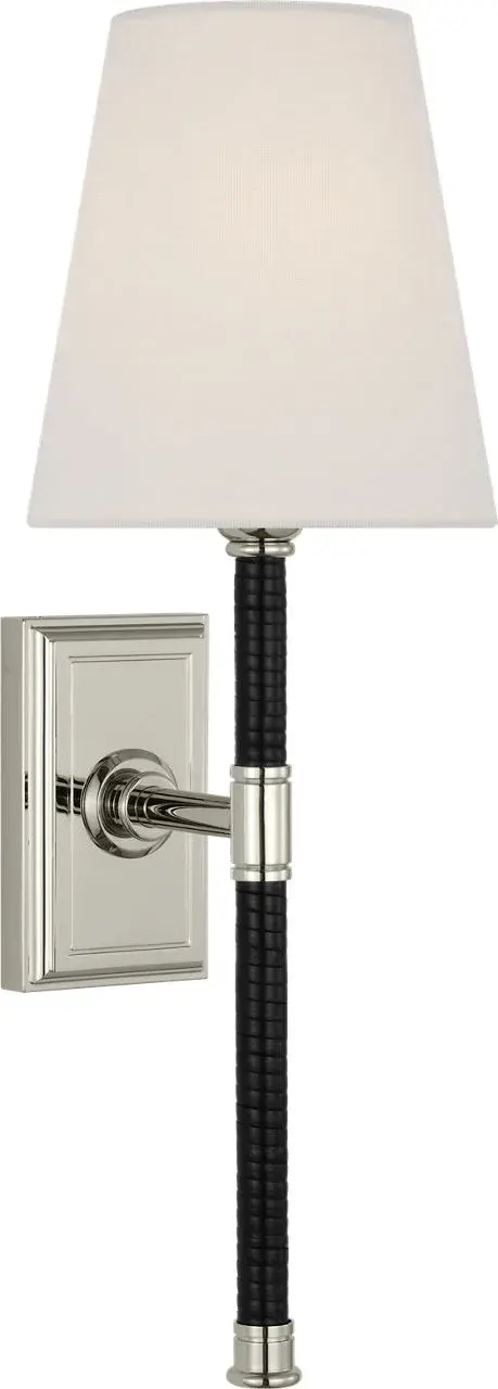 The Basden Tail Sconce blends polished nickel with black rattan detailing and a soft linen shade, creating a sophisticated coastal aesthetic. Its 16-inch profile provides ample illumination while adding organic texture to any space.