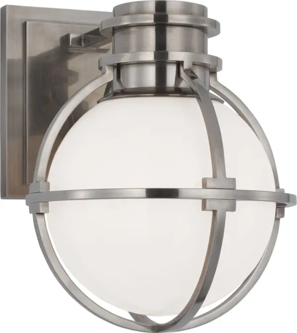 Inspired by Victorian gas-lit globe pendants, the Chapman & Myers Gracie updates the classic industrial look with modern proportions and elegant allure. Armillary details and square tube frames in various metal finishes contrast with white or clear glass to illuminate rooms with a refined touch.