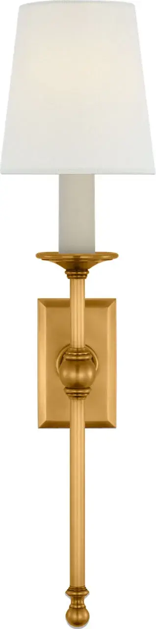 This 19-inch tail sconce combines classic design with refined materials. The antique-burnished brass finish adds warmth and sophistication, while linen shades provide soft, diffused lighting perfect for ambient illumination.