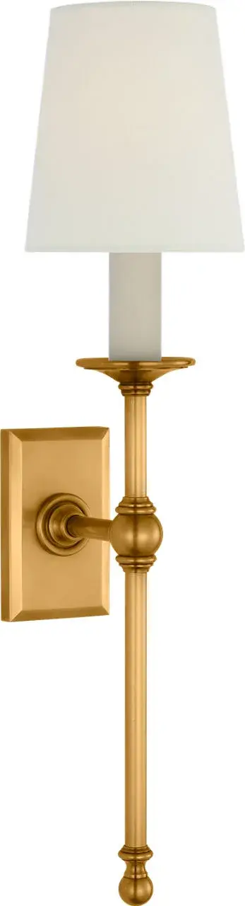 This 19-inch tail sconce combines classic design with refined materials. The antique-burnished brass finish adds warmth and sophistication, while linen shades provide soft, diffused lighting perfect for ambient illumination. - alternate view